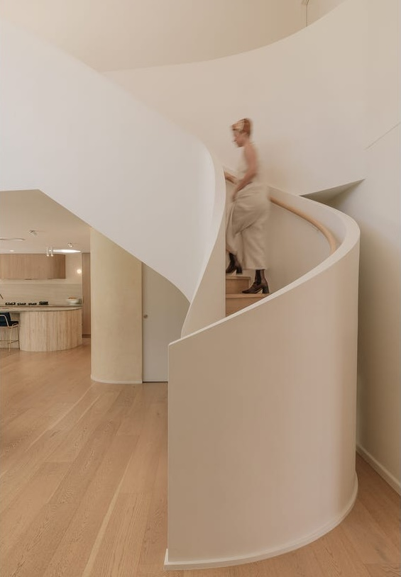 Curved timber staircase timber round handrail