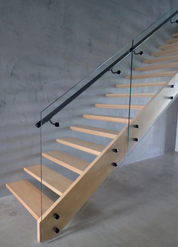 Open staircase timber tread and stringer aluminium handrail